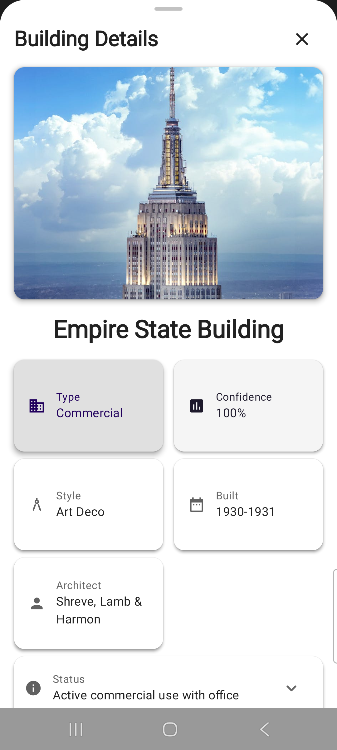 Building Lore App Screenshot showing Empire State Building historical analysis, architectural details, and building story discovery interface