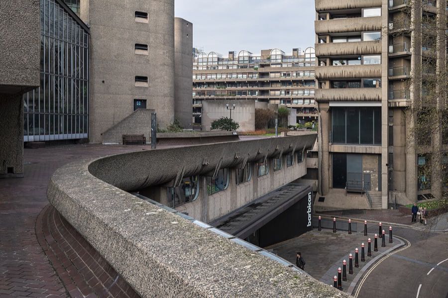 Raw concrete walkways and towers of the Barbican Estate in London, a landmark of Brutalist architecture
