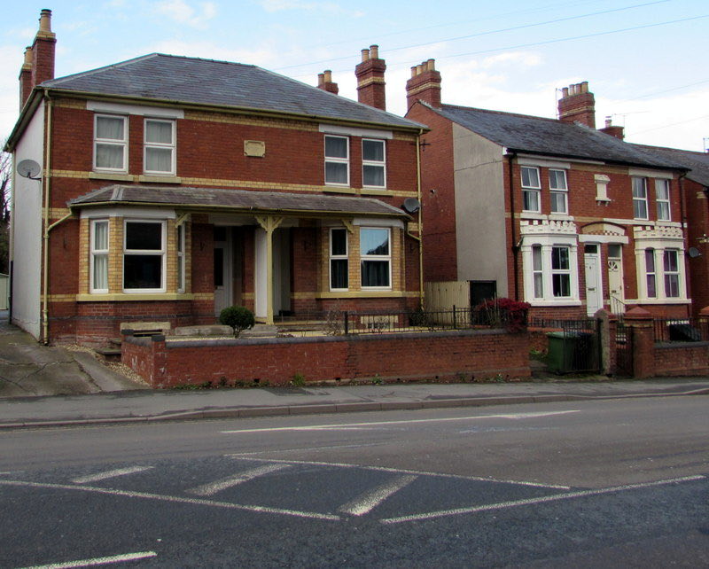 Edwardian semi-detached houses in Hereford with wide frontages, large bay windows, and white-painted decorative porches